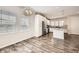 Spacious open kitchen featuring stainless steel appliances, granite countertops, and ample cabinet space at 9111 W 100Th Way, Broomfield, CO 80021