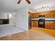 Updated kitchen featuring modern appliances and laminate wood flooring at 18508 E Whitaker Cir # D, Aurora, CO 80015