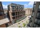 Building exterior view showcasing architectural details, and surrounding urban landscape at 1625 Larimer St # 1001, Denver, CO 80202