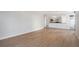Open-concept living area with sleek hardwood flooring and a modern design at 1625 Larimer St # 1001, Denver, CO 80202