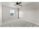Bedroom with neutral carpet, ceiling fan, and great natural light at 18014 Tree Sparrow Ave, Parker, CO 80134