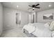Spacious primary bedroom featuring a ceiling fan and ensuite bathroom access at 18014 Tree Sparrow Ave, Parker, CO 80134