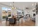 Open layout with living, dining, and backyard access, perfect for entertaining at 18014 Tree Sparrow Ave, Parker, CO 80134