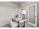 Well-lit office space with glass paneled french doors and carpeted flooring at 18014 Tree Sparrow Ave, Parker, CO 80134