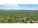 Stunning aerial view of neighborhood with lush greenery and distant mountain views at 900 Jackson St, Denver, CO 80206