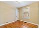 Inviting bedroom with hardwood floors, natural light, and closet at 900 Jackson St, Denver, CO 80206
