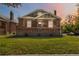 Charming brick home with a well-manicured lawn and classic architectural details at 900 Jackson St, Denver, CO 80206
