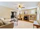 Inviting living room features a cozy fireplace and built-in shelves, perfect for relaxing and entertaining at 900 Jackson St, Denver, CO 80206