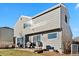 The backyard has a patio for outdoor grilling and a mix of sun and shade at 180 S Carlton St, Castle Rock, CO 80104
