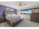 Comfortable bedroom featuring a large bed, wood furnishings, and ample natural light at 180 S Carlton St, Castle Rock, CO 80104