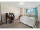 Cozy bedroom with neutral walls, bright natural light, and an inviting bed at 180 S Carlton St, Castle Rock, CO 80104