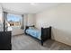 Comfortable bedroom with ample natural light and carpeted floors at 180 S Carlton St, Castle Rock, CO 80104