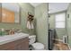 Convenient laundry area featuring modern washing machine and dryer, enhancing functionality at 180 S Carlton St, Castle Rock, CO 80104