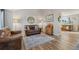 Cozy living room with hardwood floors, comfortable seating, and lots of natural light at 180 S Carlton St, Castle Rock, CO 80104