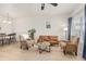 Bright living room with light wood floors, comfortable seating and stylish decor at 5537 Lewis Ct # 1, Arvada, CO 80002