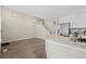 Bright, open living area with a breakfast bar and staircase access, great for modern living at 3076 W 112Th Ct # C, Westminster, CO 80031