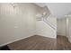 Spacious living room area with hardwood floors and staircase at 3076 W 112Th Ct # C, Westminster, CO 80031