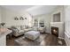 Comfortable living room features a cozy fireplace and stylish decor at 3076 W 112Th Ct # C, Westminster, CO 80031