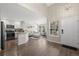 Bright, open-concept living space with vaulted ceilings, and hardwood floors at 3076 W 112Th Ct # C, Westminster, CO 80031