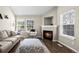 Comfortable living room features a cozy fireplace and stylish decor at 3076 W 112Th Ct # C, Westminster, CO 80031