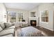 Comfortable living room features a cozy fireplace and stylish decor at 3076 W 112Th Ct # C, Westminster, CO 80031