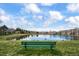 Picturesque park setting with a tranquil pond, seating, lush green surroundings, and well-maintained walking paths at 3076 W 112Th Ct # C, Westminster, CO 80031