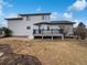 Backyard featuring a deck, grass and trees at 6400 N Windfield Ave, Parker, CO 80134