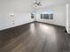 Spacious bedroom with hardwood floors, large windows, and plenty of natural light at 6400 N Windfield Ave, Parker, CO 80134