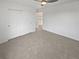 Bedroom featuring neutral carpet and closet with sliding doors at 6400 N Windfield Ave, Parker, CO 80134