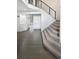 Open entryway featuring modern staircase and wood floors at 6400 N Windfield Ave, Parker, CO 80134