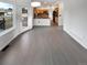 Open kitchen features wood cabinets, a breakfast bar, and stainless steel appliances at 6400 N Windfield Ave, Parker, CO 80134