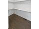 Walk-in closet featuring hardwood floors and metal shelving at 6400 N Windfield Ave, Parker, CO 80134