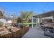 Spacious backyard featuring a covered patio, fenced in garden, and a storage shed at 3350 S Forest St, Denver, CO 80222