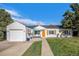 Charming ranch-style home featuring a well-maintained lawn and inviting curb appeal at 3350 S Forest St, Denver, CO 80222