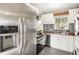 Modern kitchen with stainless steel appliances and sleek countertop at 3350 S Forest St, Denver, CO 80222