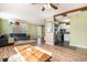 Bright, open-concept living space seamlessly flows into the kitchen area at 3350 S Forest St, Denver, CO 80222