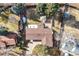 Aerial view of the property showcasing a private backyard, mature trees, and proximity to neighborhood at 6261 S Adams Dr, Centennial, CO 80121