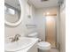 Well-lit bathroom features updated vanity, medicine cabinet, and shower at 6261 S Adams Dr, Centennial, CO 80121