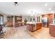 Bright eat-in kitchen, dining area with stainless steel appliances, and ample cabinet space at 6261 S Adams Dr, Centennial, CO 80121