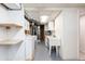Spacious laundry room with washer, dryer, shelving and storage space at 6261 S Adams Dr, Centennial, CO 80121