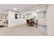 Spacious living room featuring a game table, large windows and recessed lights at 6261 S Adams Dr, Centennial, CO 80121