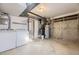 Spacious unfinished basement with washer, dryer and water heater at 9651 W Cornell Pl, Lakewood, CO 80227