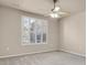 Bedroom with light colored walls, ceiling fan, carpet and window with blinds at 2210 S Vaughn Way # 103, Aurora, CO 80014