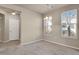 Dining room with carpet, natural light and view to the community at 2210 S Vaughn Way # 103, Aurora, CO 80014