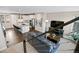 Bright open concept floor plan featuring a living room and kitchen at 11350 W Grand Ave, Littleton, CO 80127