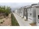 Scenic street showcases modern homes, attached garages, and minimalist landscaping at 11350 W Grand Ave, Littleton, CO 80127