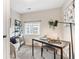 A cozy office features warm carpet, natural light, and simple furnishings at 3064 S Grape Way, Denver, CO 80222
