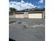 Driveway with multiple garages, providing ample parking for residents at 3548 S Hillcrest Dr # 2, Denver, CO 80237