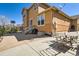 Back exterior of home with patio and staircase at 20964 E Greenwood Pl, Aurora, CO 80013