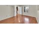 Bedroom with wood floors, window, and double doors leading to the rest of the house at 14110 E Dickinson Dr # A, Aurora, CO 80014